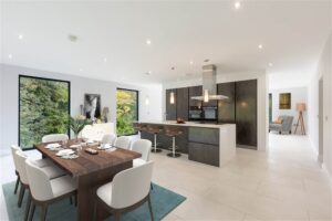 The open plan kitchen / living / dining interior at 37 Glen Road. Image used in the Holywood mansion for sale with a price tag under £1m blog post.