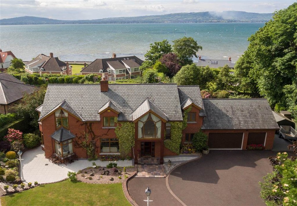 Exterior of Ailsa Road. This is a mansion in Cultra located close to Belfast Lough. A large garage can be seen to the right of the property.