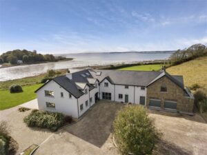 The exterior of 84a Newtownards Road, a magnificent detached property on the outskirts of Greyabbey. This property rests on the shores of Strangford Lough. Image used in the Dream houses for sale in Northern Ireland Top 10 blog post.